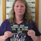 Illustration for article titled Woman Wearing Stop Domestic Violence Shirt Charged with Menacing Her Husband With a Gun